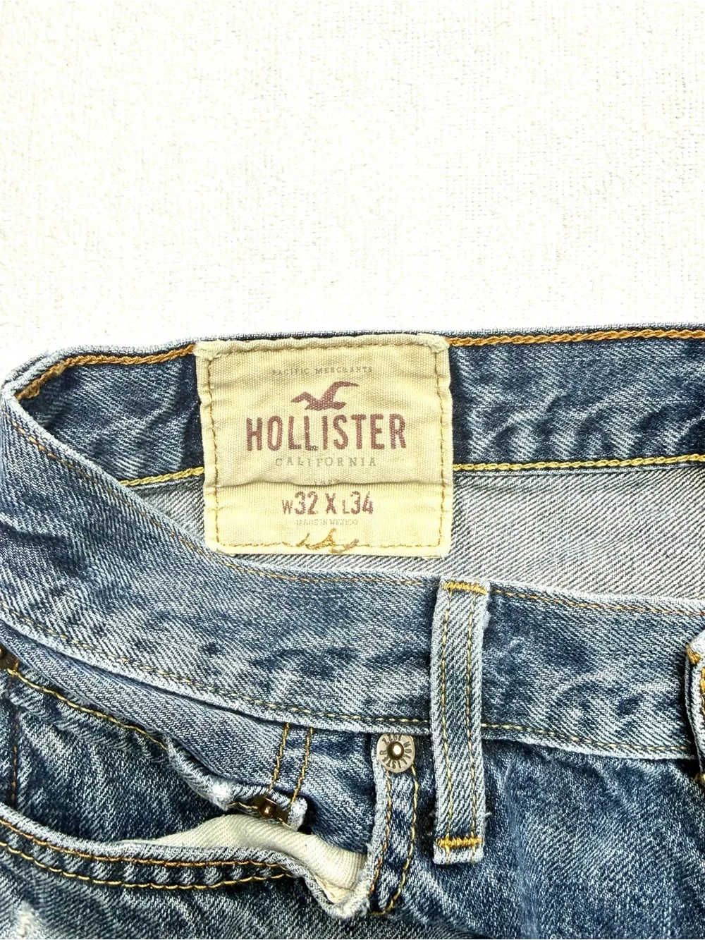Hollister Distressed Straight Jeans in Faded Blue